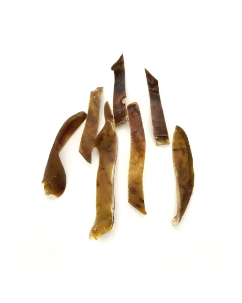 Oreja-de-cerdo-tiras-01.jpg Mr.Bones Iberijos kiaulienos ausų juostelės šunims – 100% natūralus dantų užkandis